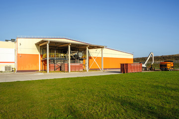Fototapeta premium Modern waste recycling processing plant. Separate garbage collection. Recycling and storage of waste for further disposal.