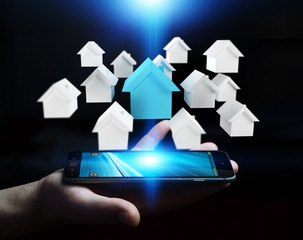 Businessman using 3D rendered small white and blue houses