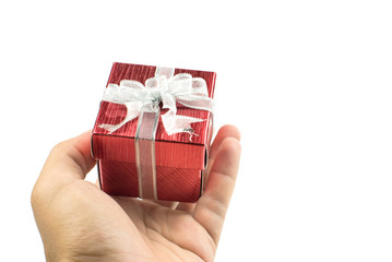 Male hands holding a gift box.Presenting gift.