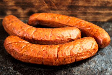 Three deliciously smoked handmade Swedish Isterband sausages with natural casing.