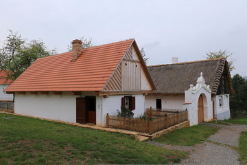 Fototapeta na wymiar Large historic farm houses with small garden
