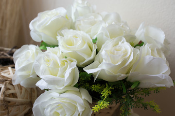 close up basket of white roses