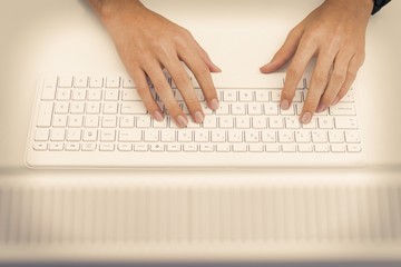 Fototapeta na wymiar hands on the computer keyboard