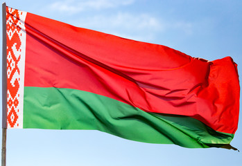 Flag of Belarus against the blue sky