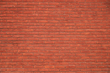 Texture - fragment of a red brick wall