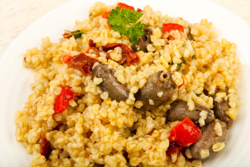 Bulgur with chicken hearts