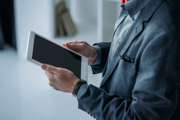 businessman using digital tablet