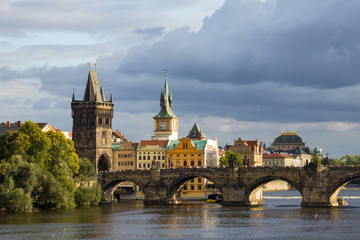 Fototapeta na wymiar Charles Bridge in Prague during the nice sunset, Czech Republic.