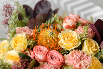 Flower composition on a gray background. Wedding and Festive decor. Bouquet from spring flowers. closeup