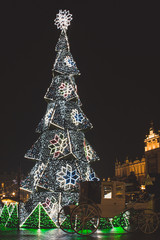 KRAKOW, POLAND - DECEMBER 22, 2016: Annual Christmas market at the Main square (Rynek Glowny). The market starts in the last week of November and lasts through December 26th.