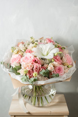 Flower composition on a gray background. Wedding and Festive decor. pink color.