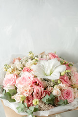 Flower composition on a gray background. Wedding and Festive decor. pink color.