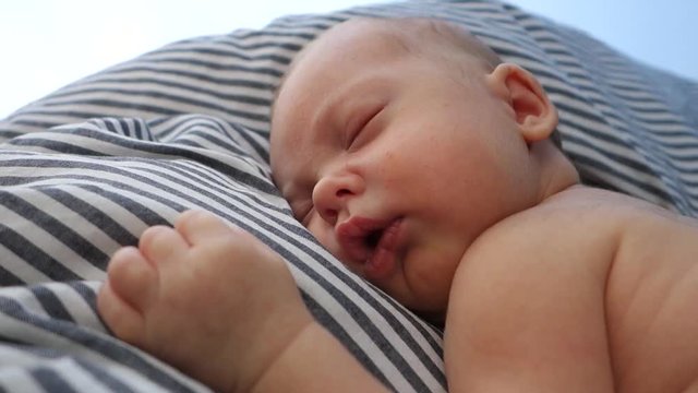 Face of a newborn baby sleeping close up