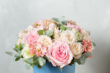 Flower composition on a gray background. Wedding and Festive decor. Bouquet from spring flowers. copy space