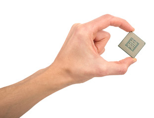 man's hand holding a computer processor