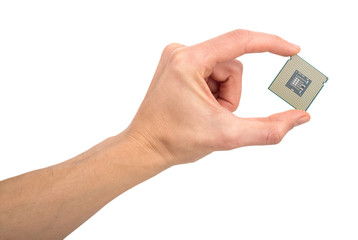 man's hand holding a computer processor