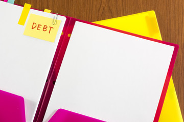 Debt; White Blank Documents with Small Message Card.