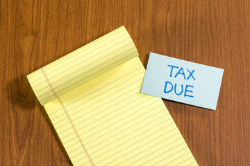 Tax Due; White Blank Documents with Small Message Card.
