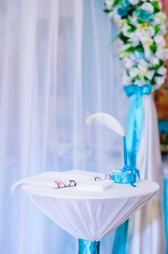 Wedding decor .Arch for carrying out of painting . beautiful wedding feather