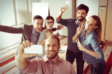 Happy young people taking a selfie