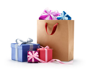 Shopping bag full of gifts isolated on with background