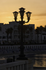 Street lamp of Otranto at sunset