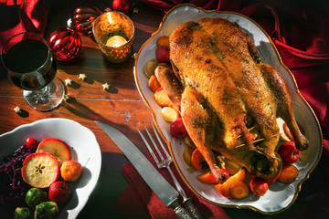 Roast Christmas duck with apples