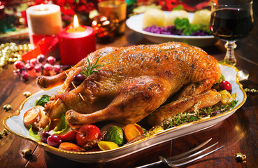 Roast Christmas duck with apples