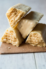 White Chocolate Wafer on wooden surface.