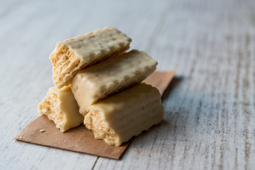 White Chocolate Wafer on wooden surface.