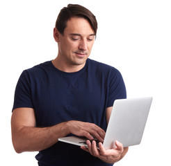man works on laptop computer. Isolated