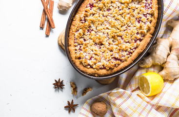 Autumn pie crumble with fruit ginger and spices.