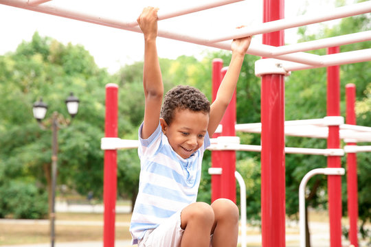 Cute African American boy on playground