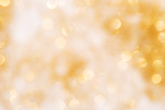 Golden bokeh. Christmas and new year theme background