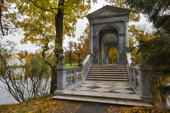 Autumn forest in Pushkin, marble bridge, Saint-Petersburg, Russia
