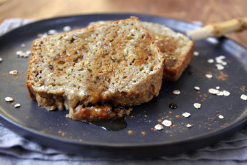 slices of banana bread with maple syrup