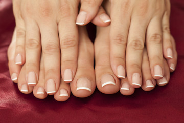 feminine feet and hands with nicely fixed nails