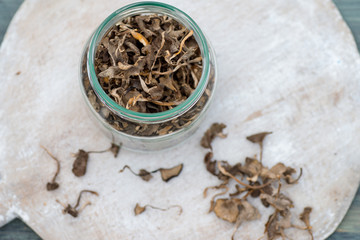 Dried trumpet chantarelles in jar