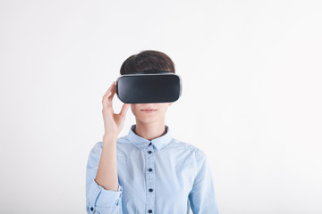 girl in virtual reality headset on white background