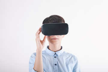 girl in virtual reality headset on white background