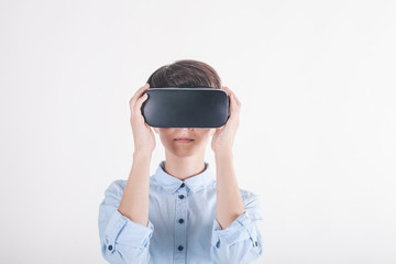 girl in virtual reality headset on white background