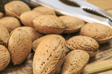 Group of almonds with hammer