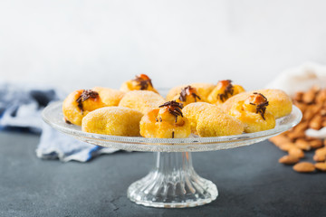 Almond pastry, cookies, biscuits, sweets on a table