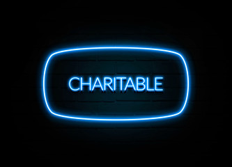 Charitable  - colorful Neon Sign on brickwall
