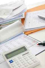 Close-Ups of Desk depicting different occupations professions: Account / Tax consultant