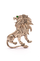 Obraz premium Silver lion brooch isolated on white