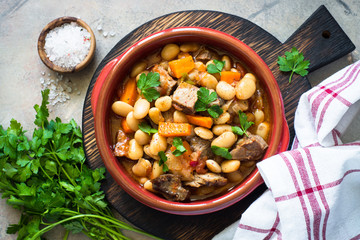 Beef stew with beans and vegetables. Top view.