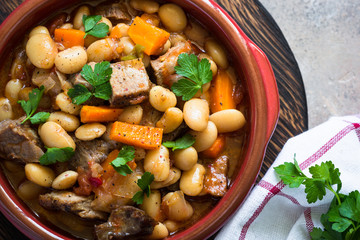 Beef stew with beans and vegetables.