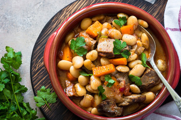 Beef stew with beans and vegetables. Top view.