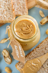 Homemade peanut butter from roasted peanuts in jar